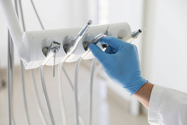 Professional Tooth Extraction technician working in Nashville, IL